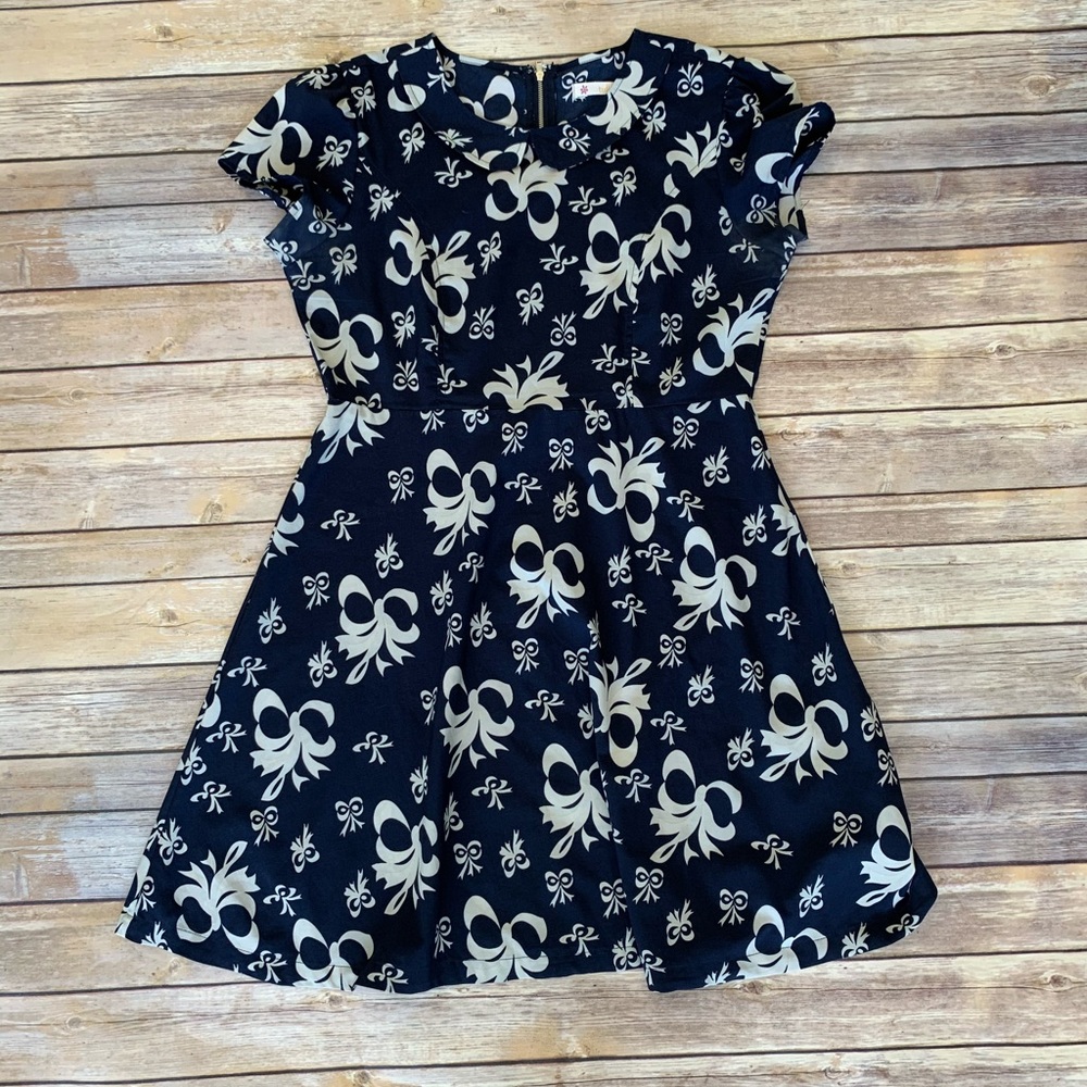Tulle - Fit and Flaire “Bow” dress.